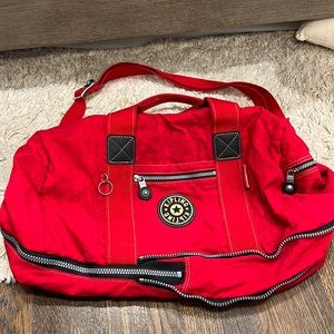 Kipling red duffel bag